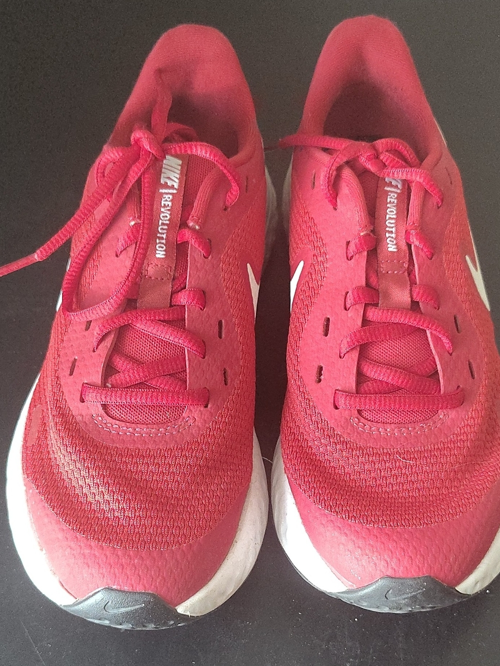 Nike Women's Red Athletic Sneakers with White Swoosh